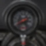 Close-up of Costco tire inflator showcasing its control panel and pressure gauge.
