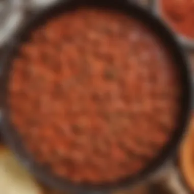Simmering Mixture of Flavors A vibrant mixture of ground meat and sauce simmering in a pan