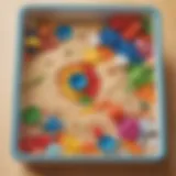 Colorful sensory bin filled with rice and toys