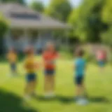 Children engaged in a game of frisbee in a sunny yard