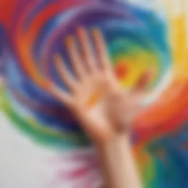 Child's hand immersed in a swirl of paint