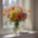 Fresh flowers in a vase by the window