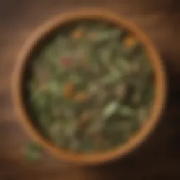 Herbal tea leaves in wooden bowl