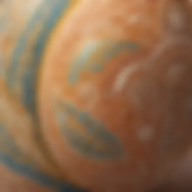 Intricate Patterns on Egg Close-up of an egg being adorned with intricate patterns using a fine brush.