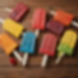 Colorful array of homemade popsicles arranged on a wooden surface.