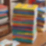 Colorful kindergarten prep books stacked on a table with educational materials.