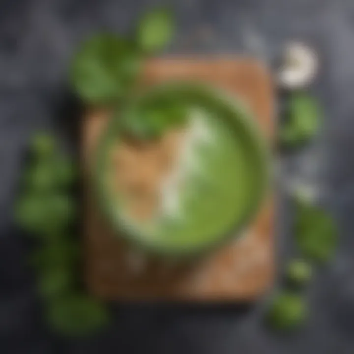 A green smoothie garnished with coconut flakes and mint leaves