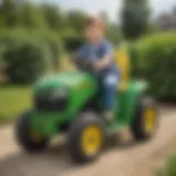 Child driving the Peg Perego John Deere Tractor