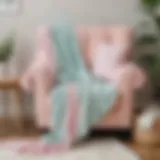 Mermaid tail blanket in soft pastel colors draped over a cozy armchair